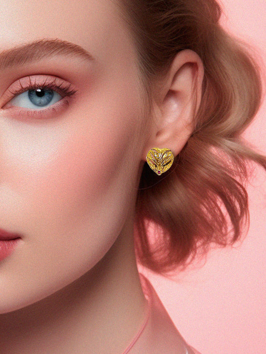 Aretes corazón topo dorado