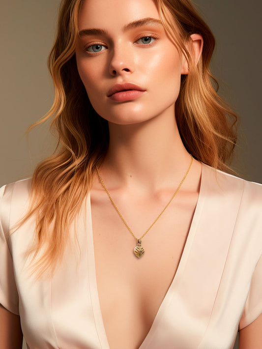 Collar corazon de oro 18k y diamantes.