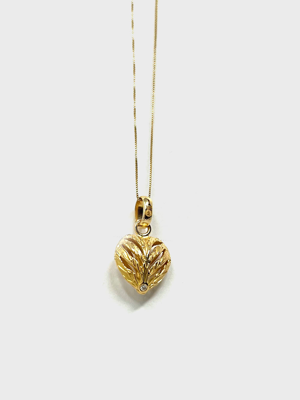 Collar corazon de oro 18k y diamantes.