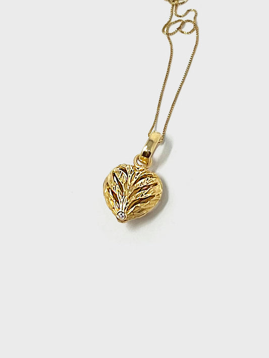 Collar corazon de oro 18k y diamantes.