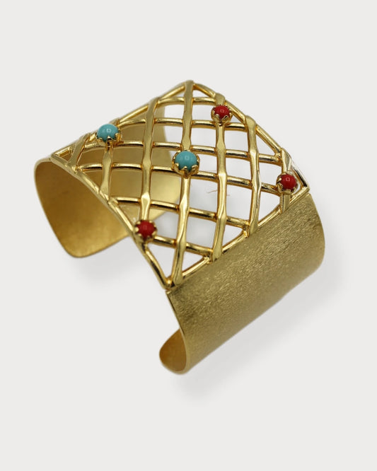 Pulsera ROZBEH rejilla con corales rojos y turquesas.
